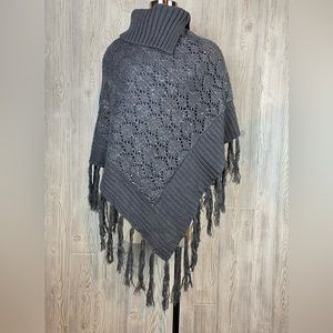 Cable knit poncho